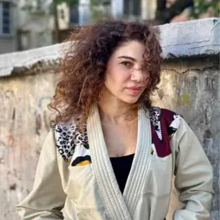 Iva Modli BJJ Blue Belt Practitioner | Alpha Catto